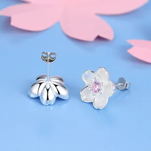Silver cherry blossom stud earrings with pink cubic zirconia for sweet daily wear.