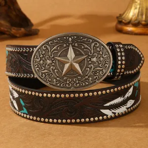 American western style vintage leather belt with carved star buckle and feather detail