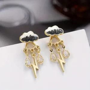 Chic gold-tone cloud and lightning drop earrings featuring sparkling cubic zirconia stones.