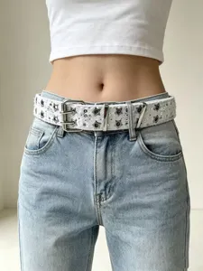 Punk style white star double grommet belt for trendy denim jeans, cool fashion accessory.