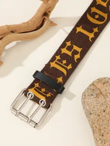 Vintage brown canvas belt with gothic letters, double-prong metal buckle and casual style.