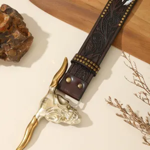 Western vintage genuine leather tooled belt with bull skull buckle and metal studs.