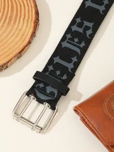 Detail shot of vintage gothic canvas belt with double pin buckle and unique cross pattern.