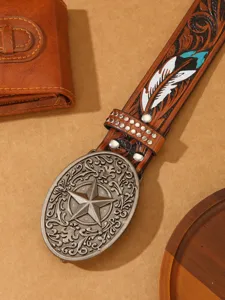 Western vintage carved leather belt with star buckle and feather motif for cowboy styling.