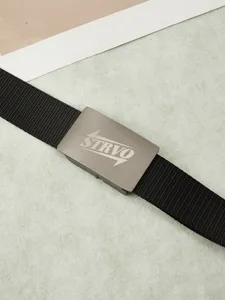 Vue détaillée de la ceinture en toile tactique avec boucle métal et sangle en nylon.