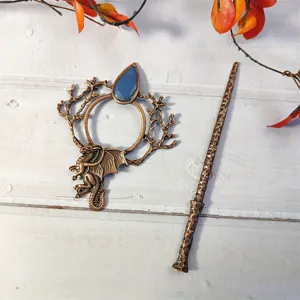 Vintage dragon hair pin shawl ring set with blue stone, exquisite Nordic fantasy hair accessory detail.