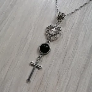Vintage heart cross black crystal necklace pendant detail view, gothic retro sweater chain.