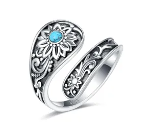 Close-up detail view of the exquisite vintage bohemian silver sunflower turquoise adjustable ring.