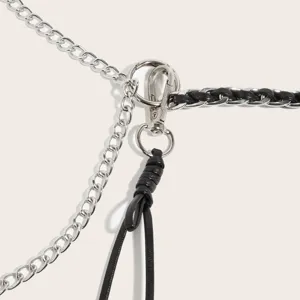 Fashionable metal and leather waist chain accessory, perfect for dresses and suits.