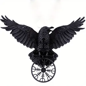 Close-up detail of the vintage gothic black raven hair clip with nordic rune wheel charm.