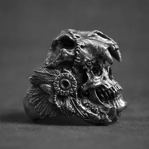 Men vintage punk skull ring with feather headdress detail. Bold gothic style jewelry piece.