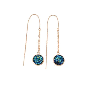 Rose gold long threader earrings featuring sparkling blue druzy round crystal drop pendants.