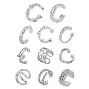 Set of 12 silver ear cuffs, non-pierced cartilage clip-on earrings with various geometric styles.