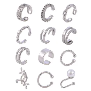 Silver ear cuffs non piercing clip on earrings set with pearl crystal and geometric designs.