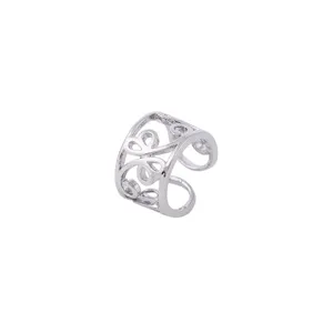 Close-up detail of silver hollow geometric ear cuff, stylish clip-on fashion jewelry.