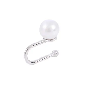 Detailed close-up shot of the U-shaped pearl ear cuff, highlighting the sleek metal and white pearl.