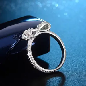 Detailed view of the sterling silver plated copper cubic zirconia bow ring, exquisite craftsmanship.