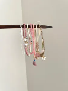 Boho multi-layer beaded bracelet set for women, delicate stackable charm jewelry accessory.