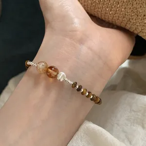 Retro Maillard brown tiger eye beaded bracelet, detail shot showing unique Chinese style jewelry.