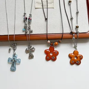 Retro sweet-cool style flower and cross pendant necklaces with beaded chains, fashion accessories.