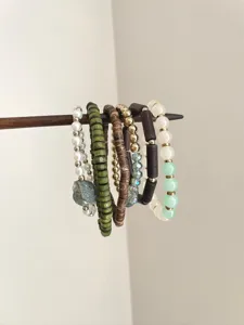Vintage multi-layer beaded stackable bracelets set with mixed natural stones and wood.