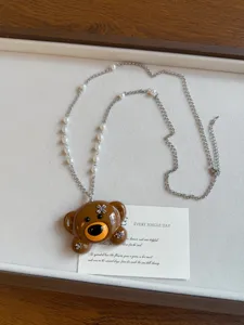 Cute brown bear pendant necklace with pearl and chain jewelry for women daily fashion wear