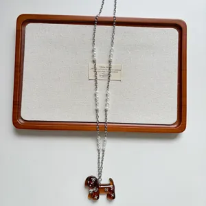 Collana con ciondolo a cucciolo perle catena lunga maglione design di nicchia donna