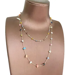 Detailed close-up view of the layered multi-color irregular crushed stone beaded necklace.