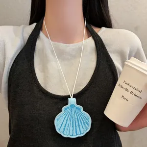 Schelp magnetische brilhouder ketting, niche ontwerp lange truiketting mode voor dames.