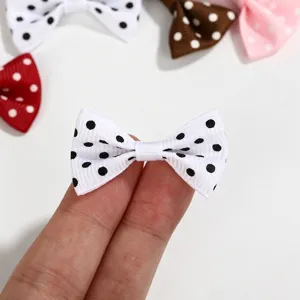 Mini white polka dot grosgrain ribbon bow for DIY crafts and hair accessories