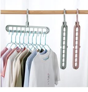 Close-up detail of a 9-hole space saving hanger used horizontally on a closet rod