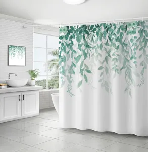 Green leaf plant shower curtain hanging in a modern and bright white bathroom setting