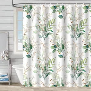 Detailed view of waterproof shower curtain with green eucalyptus and gold leaf patterns