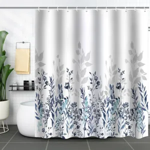 Modern waterproof shower curtain with blue and grey floral leaf pattern in bathroom.