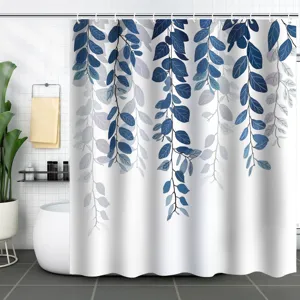 Detail showing the blue and grey leaf print on a waterproof fabric shower curtain