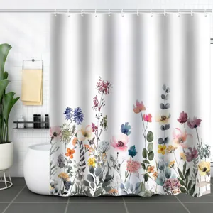 Modern watercolor wild flower pattern shower curtain in a bright, clean white bathroom