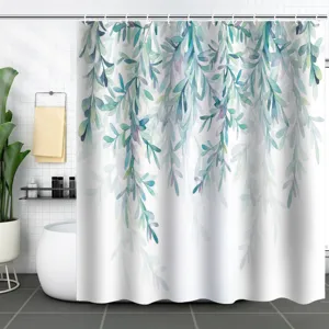 Detail view of waterproof shower curtain with green plant leaf pattern in bathroom.