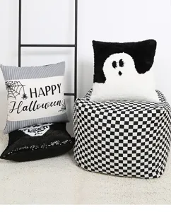 Detailed view of Halloween ghost tufted throw pillow cover, cozy black and white square cushion.