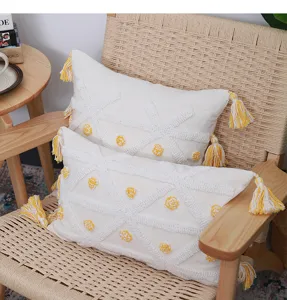 Nordic tufted cushion cover with geometric patterns and yellow tassels for home decor style.