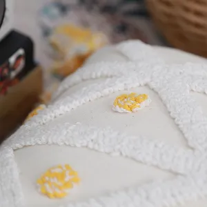 Nordic tufted throw pillow cover with geometric pattern and yellow dot accents, soft cotton.