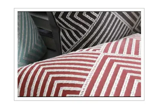 Modern minimalistische geometrische jacquard kussenhoes detail, stijlvol bankkussen.