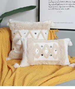 Boho tufted throw pillow covers with geometric patterns and tassels for living room decor.