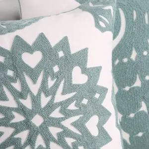 Cotton embroidered throw pillow with geometric teal star heart pattern for sofa home decor.