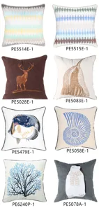 Detailed view of Nordic embroidered cushion covers featuring diverse geometric and animal patterns.
