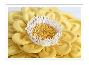 Close-up detail of yellow 3d sunflower throw pillow cover, soft floral cushion aesthetic decor.