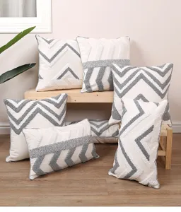 Geometric tufted throw pillow cover with grey chevron pattern for sofa home decor style.