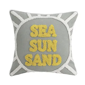 Nordic marine style throw pillow cover featuring tufted yellow letters and cute sun design.