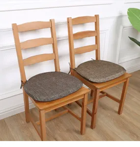 Modern simple round sponge chair cushion with ties, comfortable fabric seat pad for home dining.