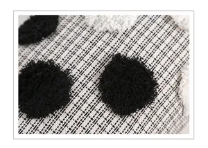 Nordic tufted pillowcase detail texture black and white loop velvet cushion close-up fabric