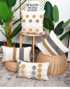 Moroccan style tufted throw pillow cover with cute pom poms and stripes boho couch cushion.